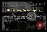 Image of Delivering newspapers New York City USA, 1903, second 1 stock footage video 65675040619