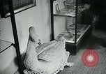 Image of various small curios Paris France, 1947, second 17 stock footage video 65675040653