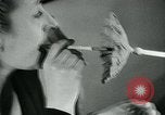 Image of various small curios Paris France, 1947, second 30 stock footage video 65675040653
