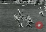 Standbild Fußballspiel College Park Maryland USA, 1951, aus Sekunde 8 historischem Filmmaterial Videoclip 65675040663