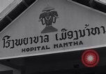 Image of Tom Dooley Laos, 1957, second 11 stock footage video 65675040709