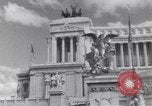 Image of allied soldiers in front of The Monument to Victor Emanuel II Italy, 1944, second 15 stock footage video 65675040763