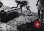 Image of Natives build World war 2 airfields in New Guinea India, 1944, second 45 stock footage video 65675040780