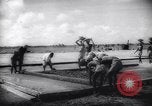 Image of Natives build World war 2 airfields in New Guinea India, 1944, second 52 stock footage video 65675040780