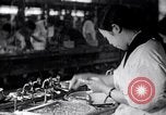 Image of Japanese workers and training of children for war Japan, 1941, second 10 stock footage video 65675040809