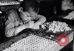 Image of Japanese workers and training of children for war Japan, 1941, second 17 stock footage video 65675040809