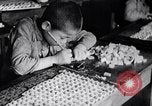 Image of Japanese workers and training of children for war Japan, 1941, second 18 stock footage video 65675040809