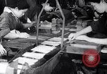 Image of Japanese workers and training of children for war Japan, 1941, second 31 stock footage video 65675040809