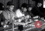 Image of Japanese workers and training of children for war Japan, 1941, second 35 stock footage video 65675040809