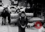 Image of Japanese workers and training of children for war Japan, 1941, second 36 stock footage video 65675040809