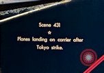 Image of Navy fighter aircraft landing on USS Essex Pacific Theater, 1945, second 1 stock footage video 65675040813