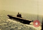 Image of Navy fighter aircraft landing on USS Essex Pacific Theater, 1945, second 12 stock footage video 65675040813