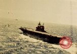 Image of Navy fighter aircraft landing on USS Essex Pacific Theater, 1945, second 13 stock footage video 65675040813