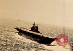 Image of Navy fighter aircraft landing on USS Essex Pacific Theater, 1945, second 15 stock footage video 65675040813