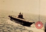Image of Navy fighter aircraft landing on USS Essex Pacific Theater, 1945, second 16 stock footage video 65675040813
