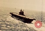 Image of Navy fighter aircraft landing on USS Essex Pacific Theater, 1945, second 17 stock footage video 65675040813