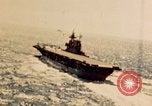 Image of Navy fighter aircraft landing on USS Essex Pacific Theater, 1945, second 18 stock footage video 65675040813