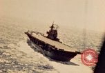 Image of Navy fighter aircraft landing on USS Essex Pacific Theater, 1945, second 21 stock footage video 65675040813