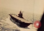 Image of Navy fighter aircraft landing on USS Essex Pacific Theater, 1945, second 22 stock footage video 65675040813