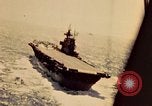 Image of Navy fighter aircraft landing on USS Essex Pacific Theater, 1945, second 24 stock footage video 65675040813