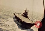 Image of Navy fighter aircraft landing on USS Essex Pacific Theater, 1945, second 26 stock footage video 65675040813