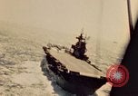 Image of Navy fighter aircraft landing on USS Essex Pacific Theater, 1945, second 27 stock footage video 65675040813