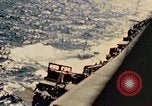 Image of Navy fighter aircraft landing on USS Essex Pacific Theater, 1945, second 29 stock footage video 65675040813