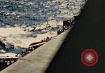 Image of Navy fighter aircraft landing on USS Essex Pacific Theater, 1945, second 31 stock footage video 65675040813