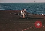 Image of Navy fighter aircraft landing on USS Essex Pacific Theater, 1945, second 33 stock footage video 65675040813