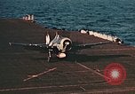 Image of Navy fighter aircraft landing on USS Essex Pacific Theater, 1945, second 34 stock footage video 65675040813