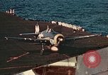 Image of Navy fighter aircraft landing on USS Essex Pacific Theater, 1945, second 35 stock footage video 65675040813