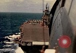 Image of Navy fighter aircraft landing on USS Essex Pacific Theater, 1945, second 36 stock footage video 65675040813