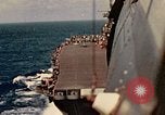 Image of Navy fighter aircraft landing on USS Essex Pacific Theater, 1945, second 37 stock footage video 65675040813