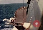 Image of Navy fighter aircraft landing on USS Essex Pacific Theater, 1945, second 38 stock footage video 65675040813