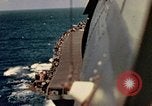 Image of Navy fighter aircraft landing on USS Essex Pacific Theater, 1945, second 39 stock footage video 65675040813