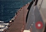 Image of Navy fighter aircraft landing on USS Essex Pacific Theater, 1945, second 44 stock footage video 65675040813