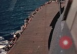 Image of Navy fighter aircraft landing on USS Essex Pacific Theater, 1945, second 45 stock footage video 65675040813
