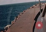 Image of Navy fighter aircraft landing on USS Essex Pacific Theater, 1945, second 46 stock footage video 65675040813