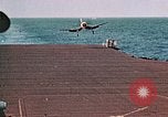 Image of Navy fighter aircraft landing on USS Essex Pacific Theater, 1945, second 47 stock footage video 65675040813