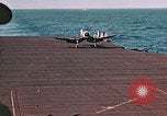 Image of Navy fighter aircraft landing on USS Essex Pacific Theater, 1945, second 48 stock footage video 65675040813