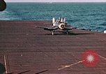 Image of Navy fighter aircraft landing on USS Essex Pacific Theater, 1945, second 49 stock footage video 65675040813
