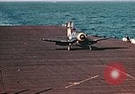 Image of Navy fighter aircraft landing on USS Essex Pacific Theater, 1945, second 50 stock footage video 65675040813