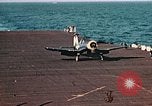 Image of Navy fighter aircraft landing on USS Essex Pacific Theater, 1945, second 51 stock footage video 65675040813