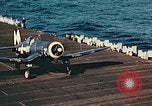 Image of Navy fighter aircraft landing on USS Essex Pacific Theater, 1945, second 53 stock footage video 65675040813