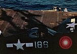 Image of Navy fighter aircraft landing on USS Essex Pacific Theater, 1945, second 60 stock footage video 65675040813