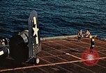 Image of Navy fighter aircraft landing on USS Essex Pacific Theater, 1945, second 61 stock footage video 65675040813