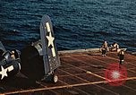 Image of Navy fighter aircraft landing on USS Essex Pacific Theater, 1945, second 62 stock footage video 65675040813