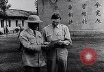 Immagine di Il Brigadiere Generale Chennault con le Tigri volanti Cina, 1942, secondo 12 filmato di repertorio 65675040821