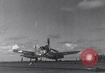 Image of F4U Corsair noses over Pacific Theater, 1943, second 8 stock footage video 65675040834