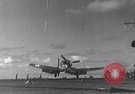Image of F4U Corsair noses over Pacific Theater, 1943, second 10 stock footage video 65675040834